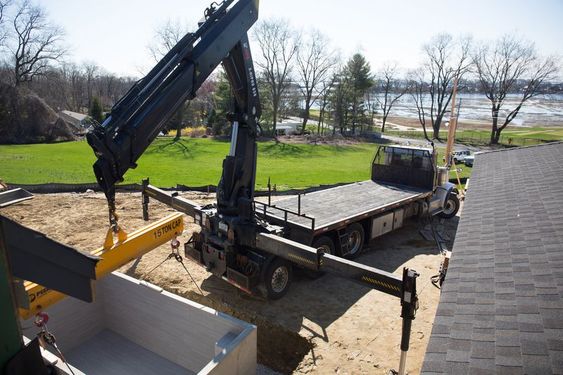 Installing plunge pool using heavy equipements