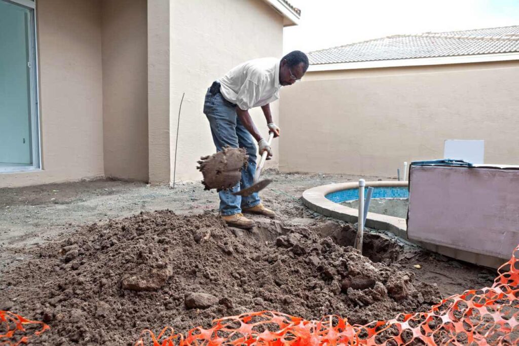 Fibreglass plunge pool backfilling and levelling.